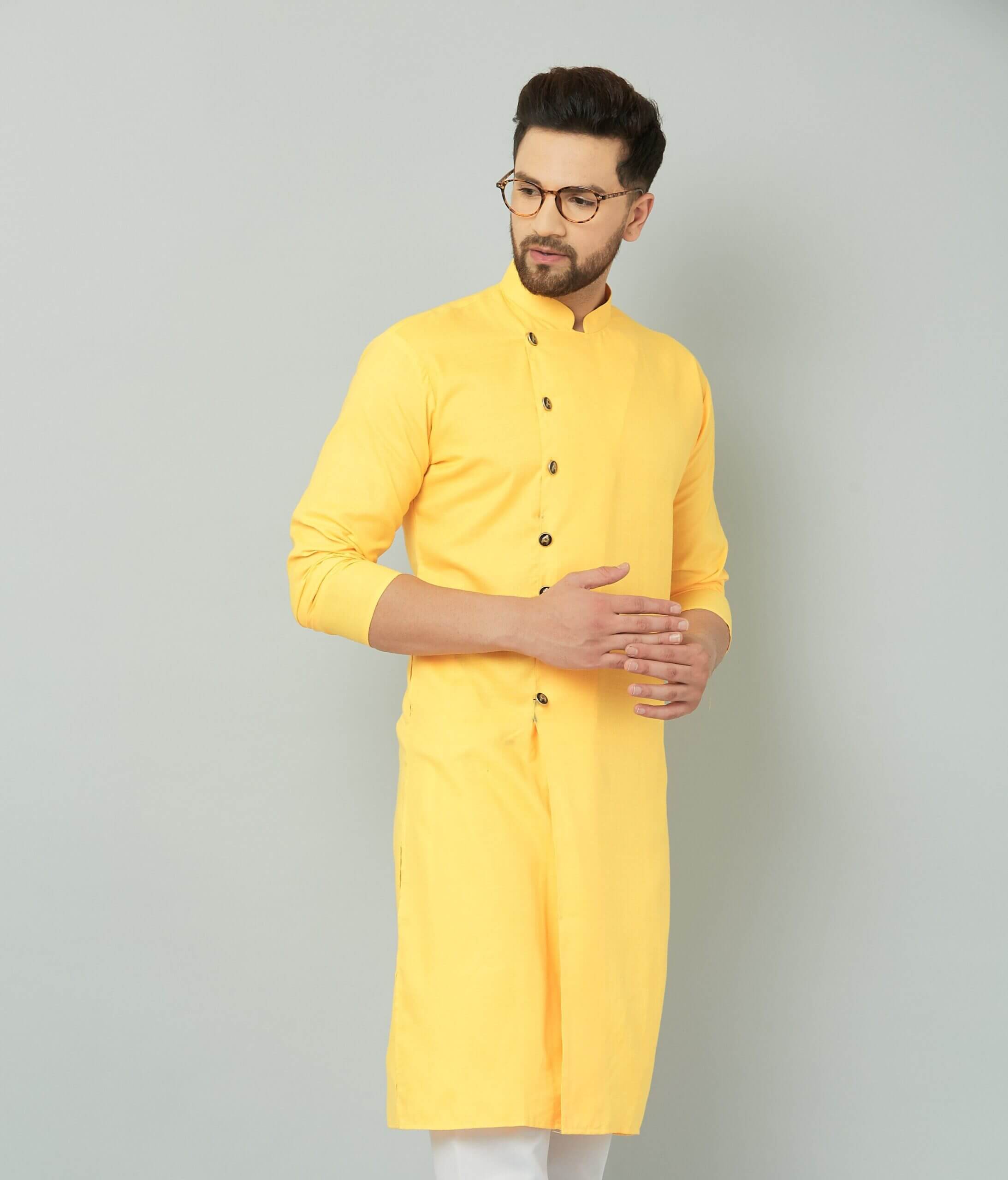 p (3)-min Traditional Indian yellow cotton kurta.