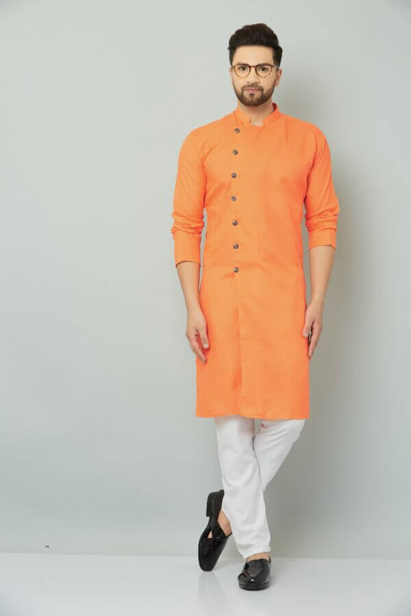 Traditional Indian orange kurta with intricate embroidery.
