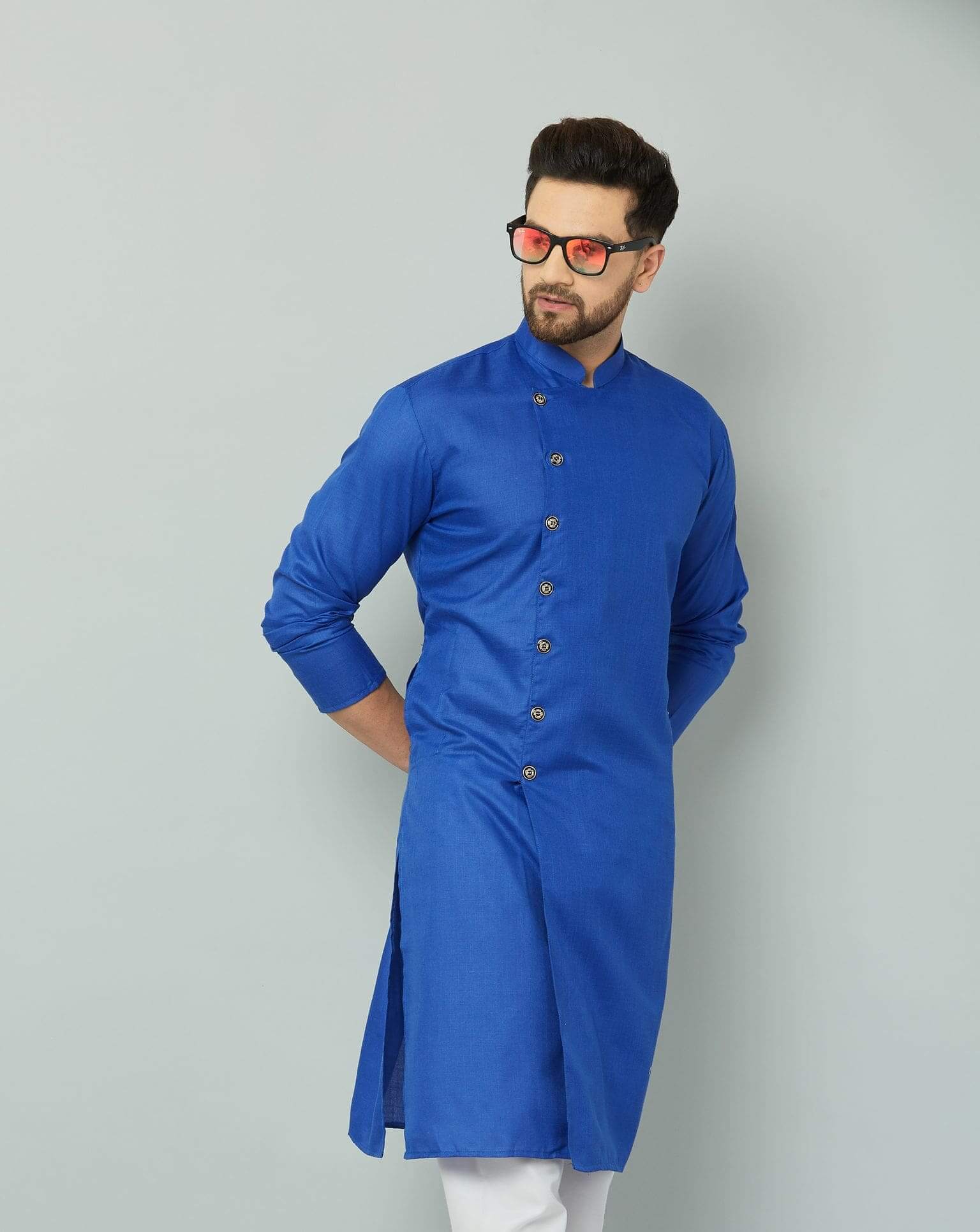 p-min Blue cotton kurta paired with white pants.